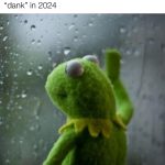Sad Kermit looking out rainy window