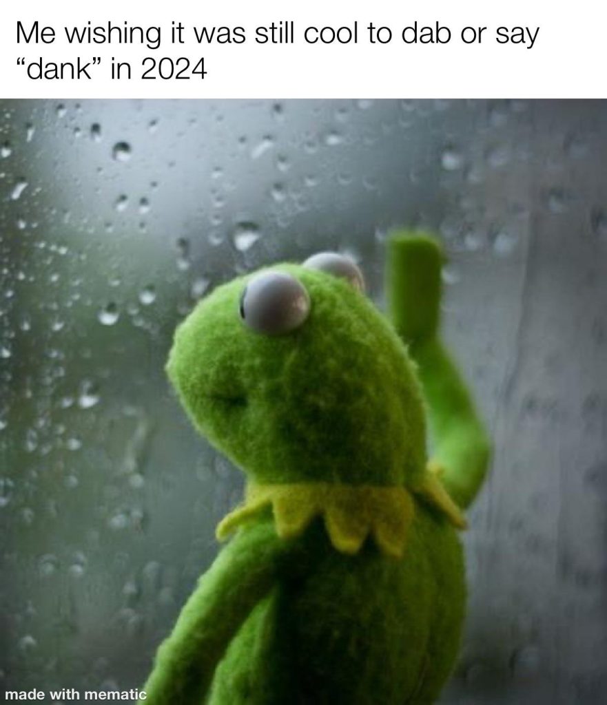 Sad Kermit looking out rainy window